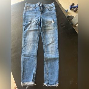 Lightly distressed blue jeans